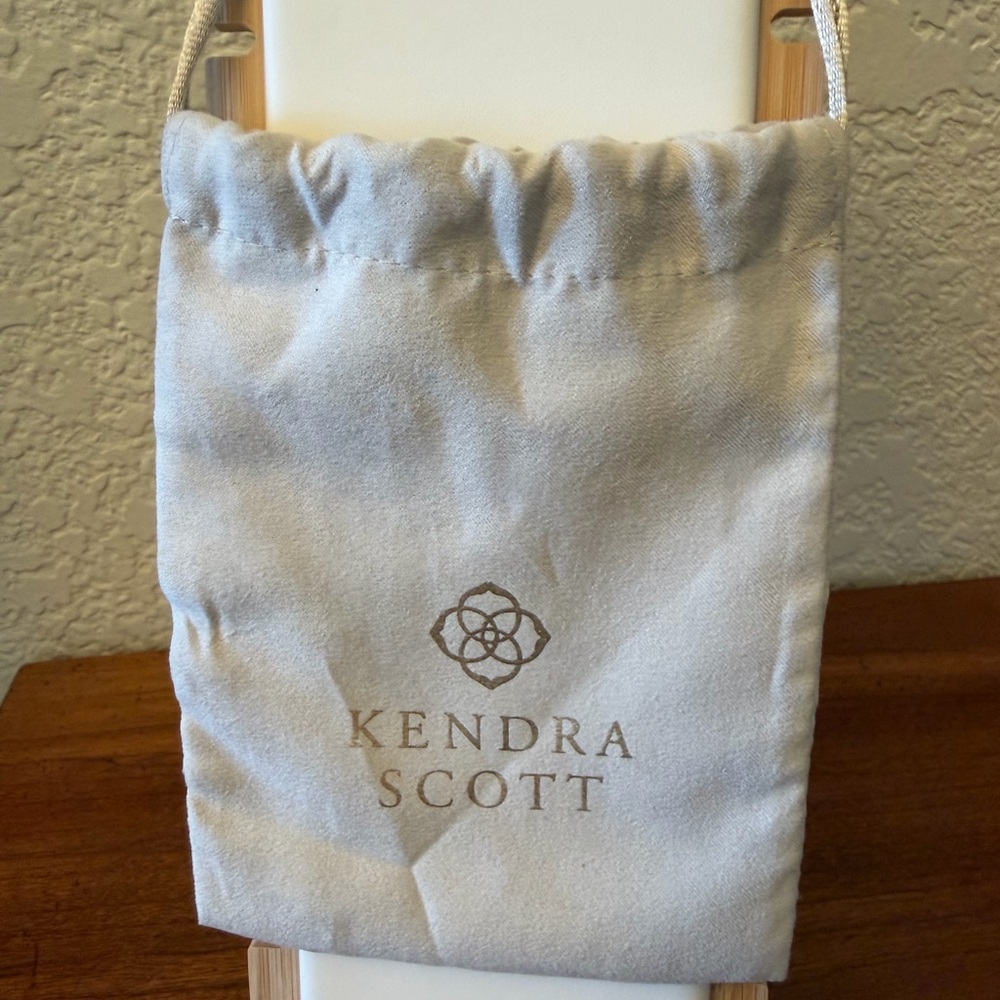 Kendra Scott Cream Pouch with Gold Logo